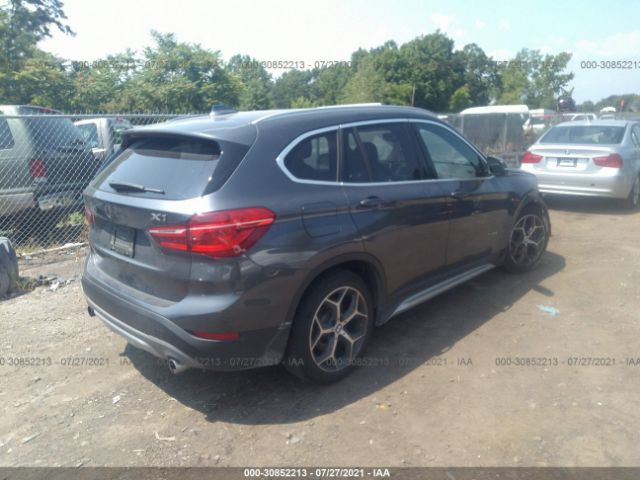 Photo 3 VIN: WBXHT3Z33G4A51154 - BMW X1 