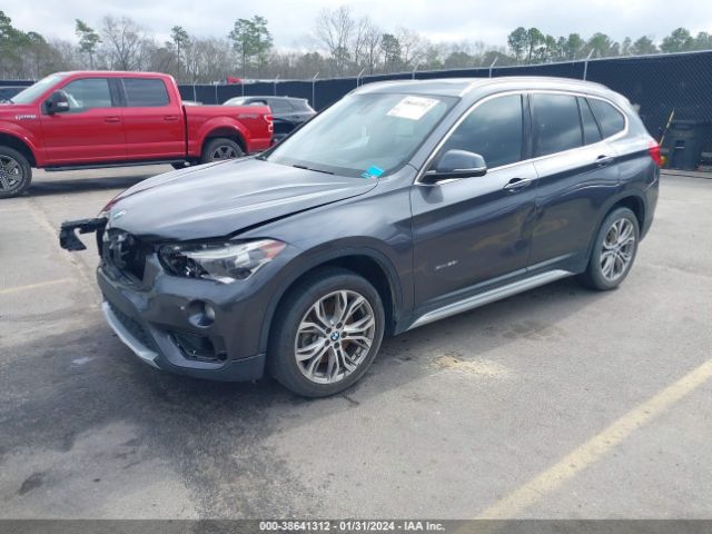 Photo 1 VIN: WBXHT3Z33H4A54704 - BMW X1 