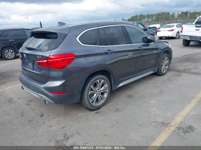 Photo 3 VIN: WBXHT3Z33H4A54704 - BMW X1 