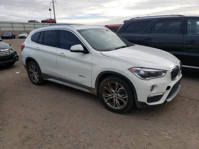 Photo 3 VIN: WBXHT3Z33H4A64942 - BMW X1 