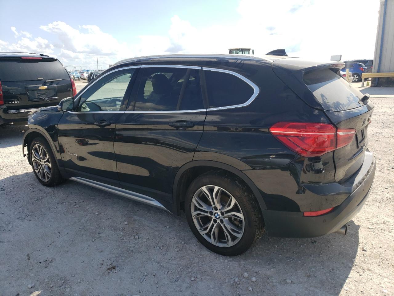 Photo 1 VIN: WBXHT3Z34G4A48456 - BMW X1 