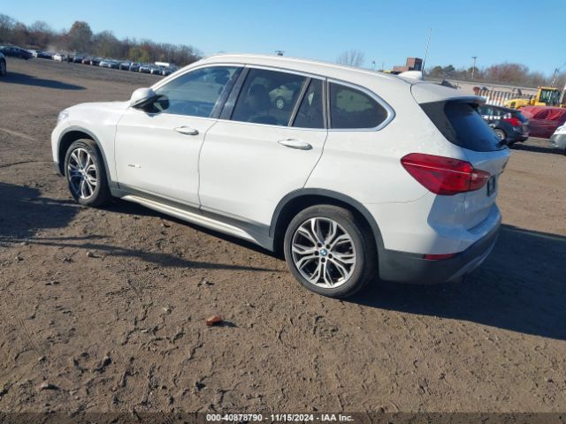 Photo 2 VIN: WBXHT3Z34G4A50675 - BMW X1 