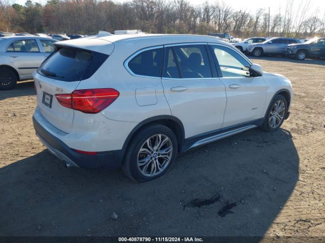 Photo 3 VIN: WBXHT3Z34G4A50675 - BMW X1 