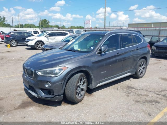 Photo 1 VIN: WBXHT3Z34G4A51874 - BMW X1 