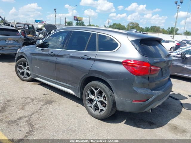 Photo 2 VIN: WBXHT3Z34G4A51874 - BMW X1 