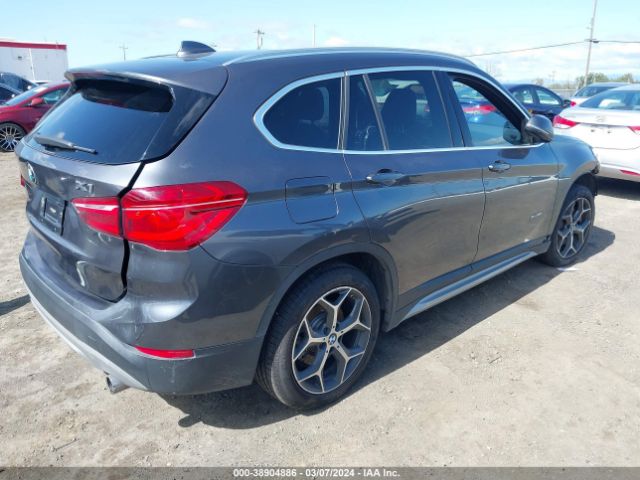 Photo 3 VIN: WBXHT3Z34H4A53982 - BMW X1 