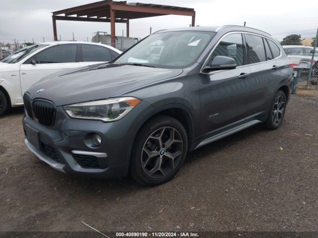 Photo 1 VIN: WBXHT3Z34H4A55134 - BMW X1 