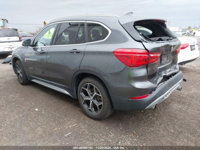 Photo 2 VIN: WBXHT3Z34H4A55134 - BMW X1 