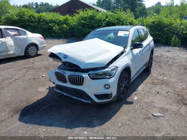 Photo 1 VIN: WBXHT3Z34H4A55568 - BMW X1 