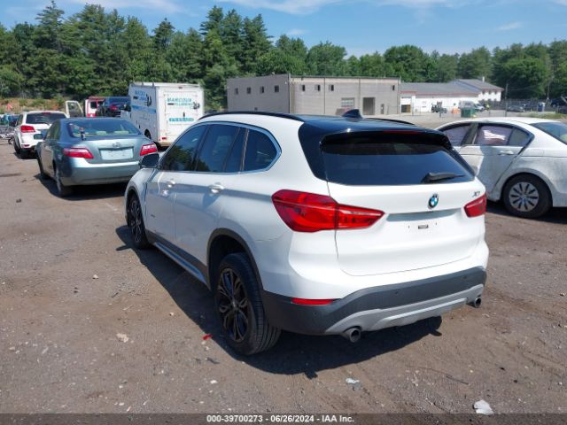 Photo 2 VIN: WBXHT3Z34H4A55568 - BMW X1 