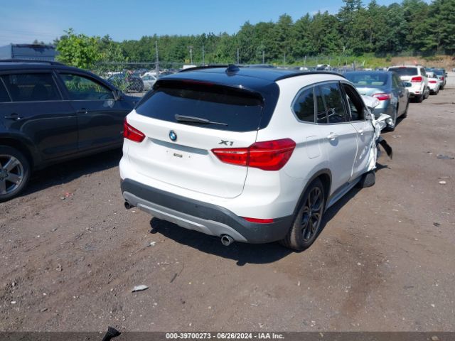 Photo 3 VIN: WBXHT3Z34H4A55568 - BMW X1 