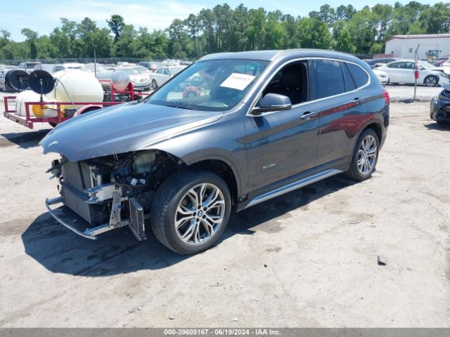 Photo 1 VIN: WBXHT3Z34H4A57336 - BMW X1 