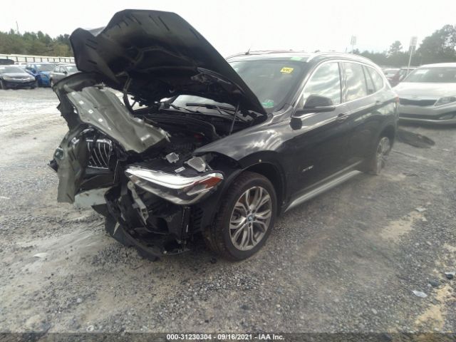 Photo 1 VIN: WBXHT3Z34H4A57952 - BMW X1 