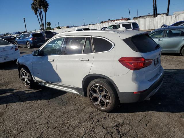 Photo 1 VIN: WBXHT3Z34J4A66771 - BMW X1 XDRIVE2 