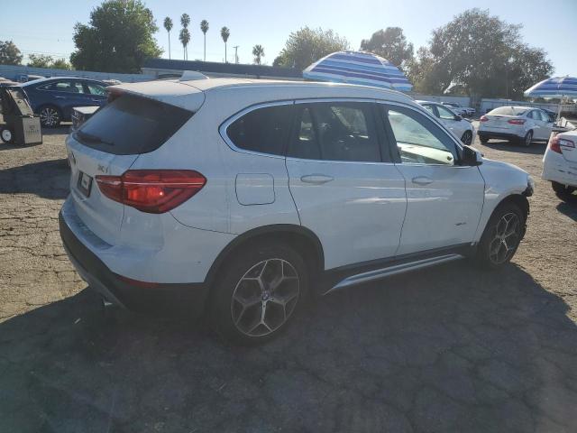 Photo 2 VIN: WBXHT3Z34J4A66771 - BMW X1 XDRIVE2 