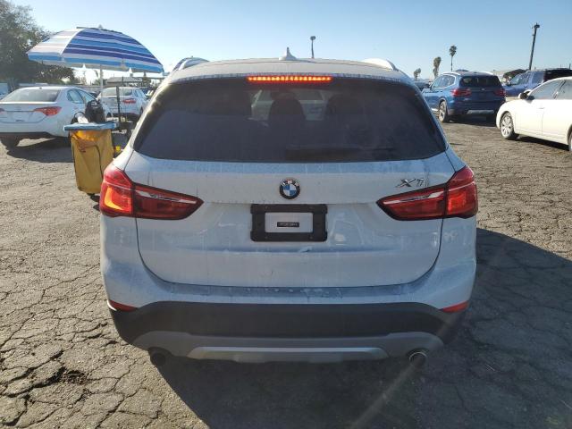 Photo 5 VIN: WBXHT3Z34J4A66771 - BMW X1 XDRIVE2 