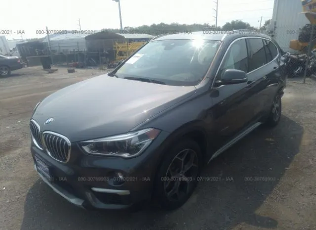 Photo 1 VIN: WBXHT3Z35G4A49695 - BMW X1 