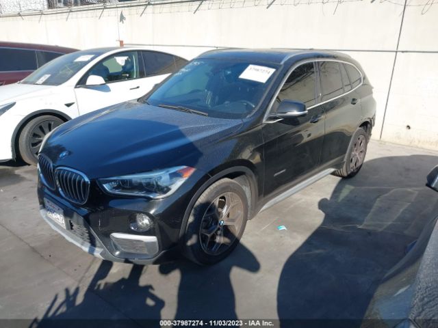 Photo 1 VIN: WBXHT3Z35G4A50541 - BMW X1 