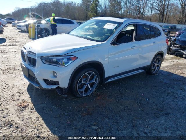 Photo 1 VIN: WBXHT3Z35H4A53506 - BMW X1 