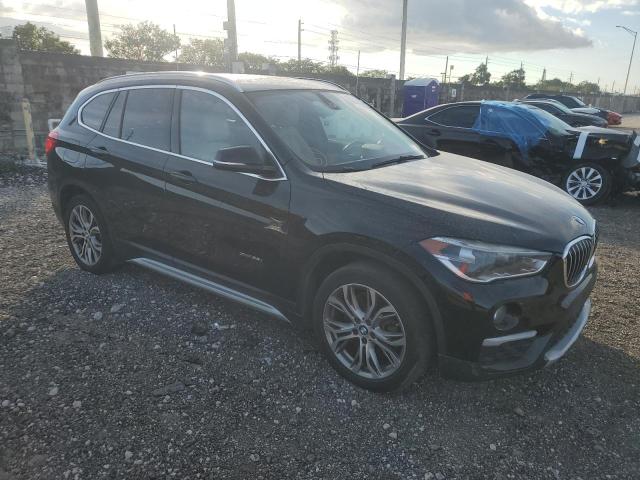 Photo 3 VIN: WBXHT3Z35H4A55692 - BMW X1 