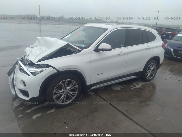 Photo 1 VIN: WBXHT3Z35H4A64926 - BMW X1 