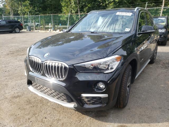 Photo 1 VIN: WBXHT3Z35J4A66231 - BMW X1 XDRIVE2 