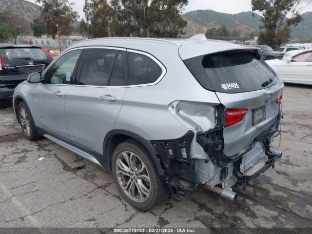 Photo 2 VIN: WBXHT3Z36G4A47857 - BMW X1 