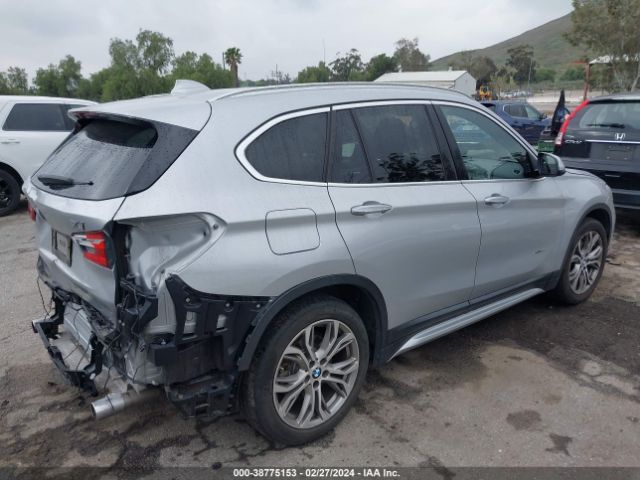 Photo 3 VIN: WBXHT3Z36G4A47857 - BMW X1 