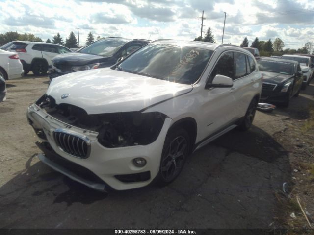 Photo 1 VIN: WBXHT3Z36G4A49155 - BMW X1 