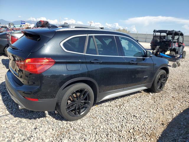 Photo 2 VIN: WBXHT3Z36G4A49172 - BMW X1 