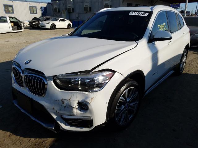 Photo 1 VIN: WBXHT3Z36G4A50662 - BMW X1 