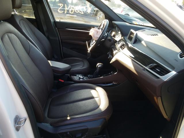 Photo 4 VIN: WBXHT3Z36G4A50662 - BMW X1 