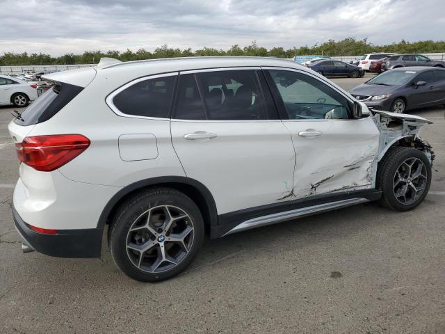 Photo 2 VIN: WBXHT3Z36J4A66481 - BMW X1 