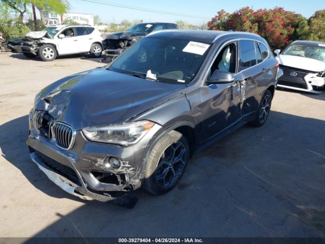 Photo 1 VIN: WBXHT3Z37H4A54012 - BMW X1 