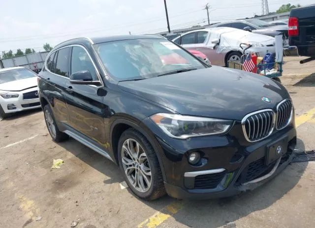 Photo 0 VIN: WBXHT3Z37H4A58335 - BMW X1 