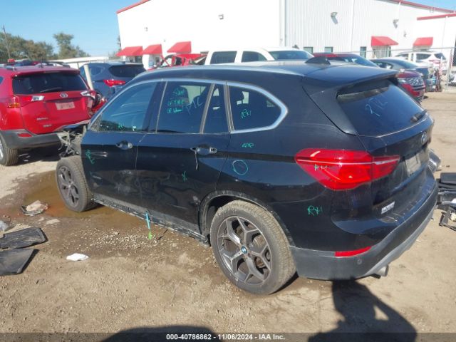 Photo 2 VIN: WBXHT3Z37H4A64992 - BMW X1 