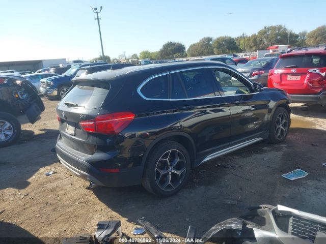 Photo 3 VIN: WBXHT3Z37H4A64992 - BMW X1 