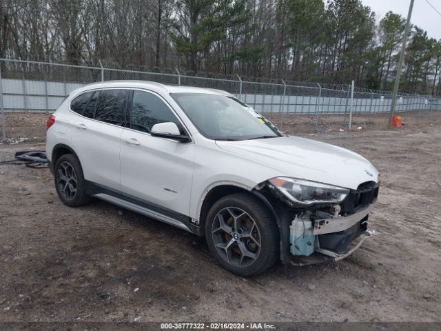 Photo 0 VIN: WBXHT3Z37H4A65141 - BMW X1 