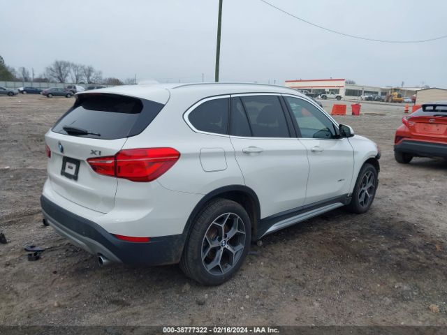 Photo 3 VIN: WBXHT3Z37H4A65141 - BMW X1 