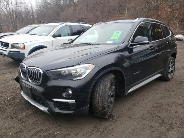 Photo 1 VIN: WBXHT3Z37J4A66232 - BMW X1 XDRIVE2 