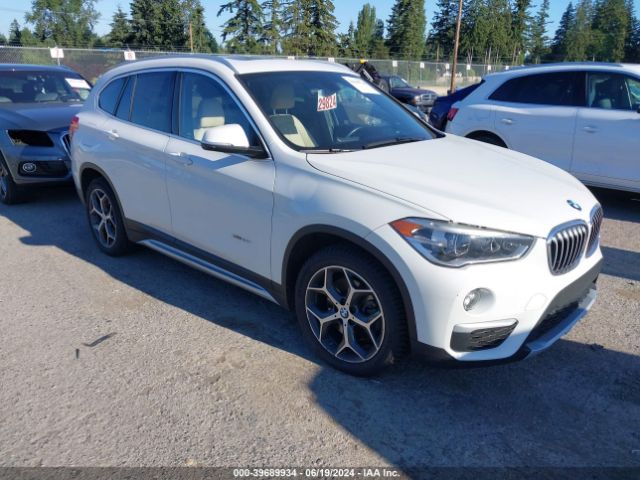 Photo 0 VIN: WBXHT3Z38G4A51585 - BMW X1 