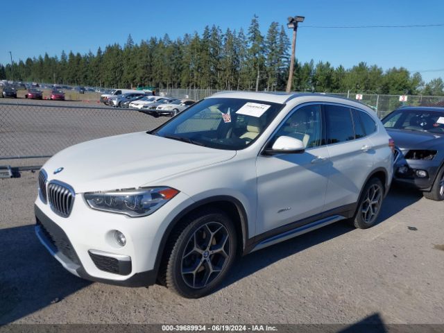 Photo 1 VIN: WBXHT3Z38G4A51585 - BMW X1 