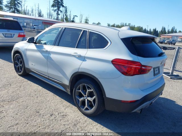 Photo 2 VIN: WBXHT3Z38G4A51585 - BMW X1 