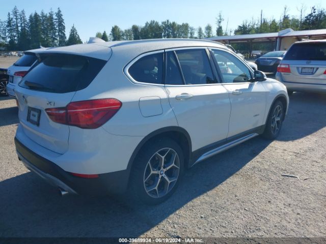 Photo 3 VIN: WBXHT3Z38G4A51585 - BMW X1 