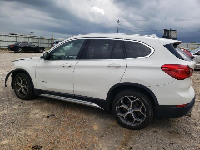 Photo 1 VIN: WBXHT3Z38H4A54942 - BMW X1 