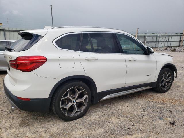 Photo 2 VIN: WBXHT3Z38H4A54942 - BMW X1 