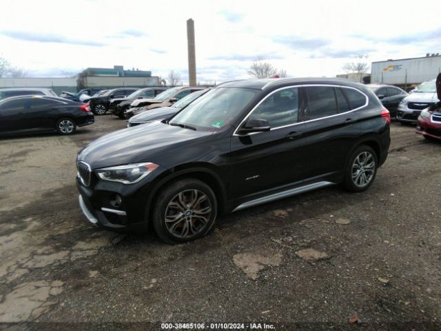 Photo 1 VIN: WBXHT3Z38H4A57923 - BMW X1 