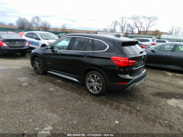 Photo 2 VIN: WBXHT3Z38H4A57923 - BMW X1 