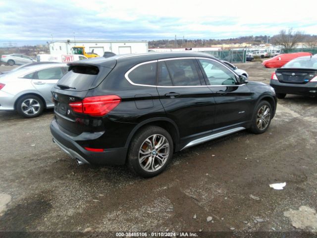 Photo 3 VIN: WBXHT3Z38H4A57923 - BMW X1 