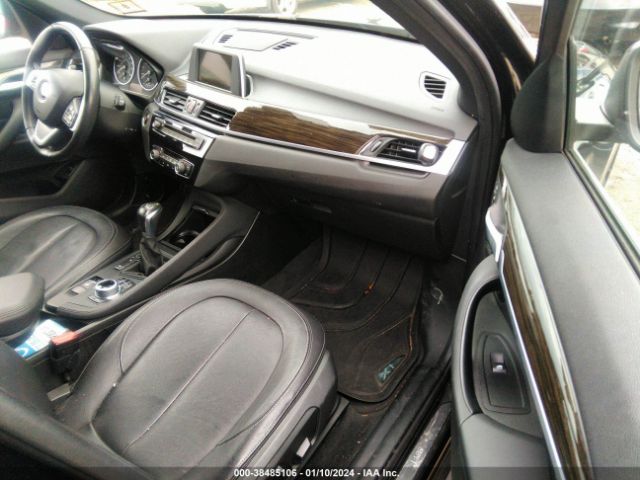 Photo 4 VIN: WBXHT3Z38H4A57923 - BMW X1 